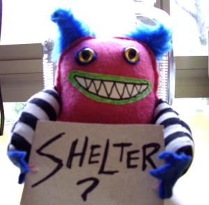 "Shelter?" by Heidi Estey. This was our poster monster for an outdoor group show in which almost all the pieces were eventually "taken in" by passersby - part of why we now put together our outdoor shows with in-house artists aware of such eventualities.